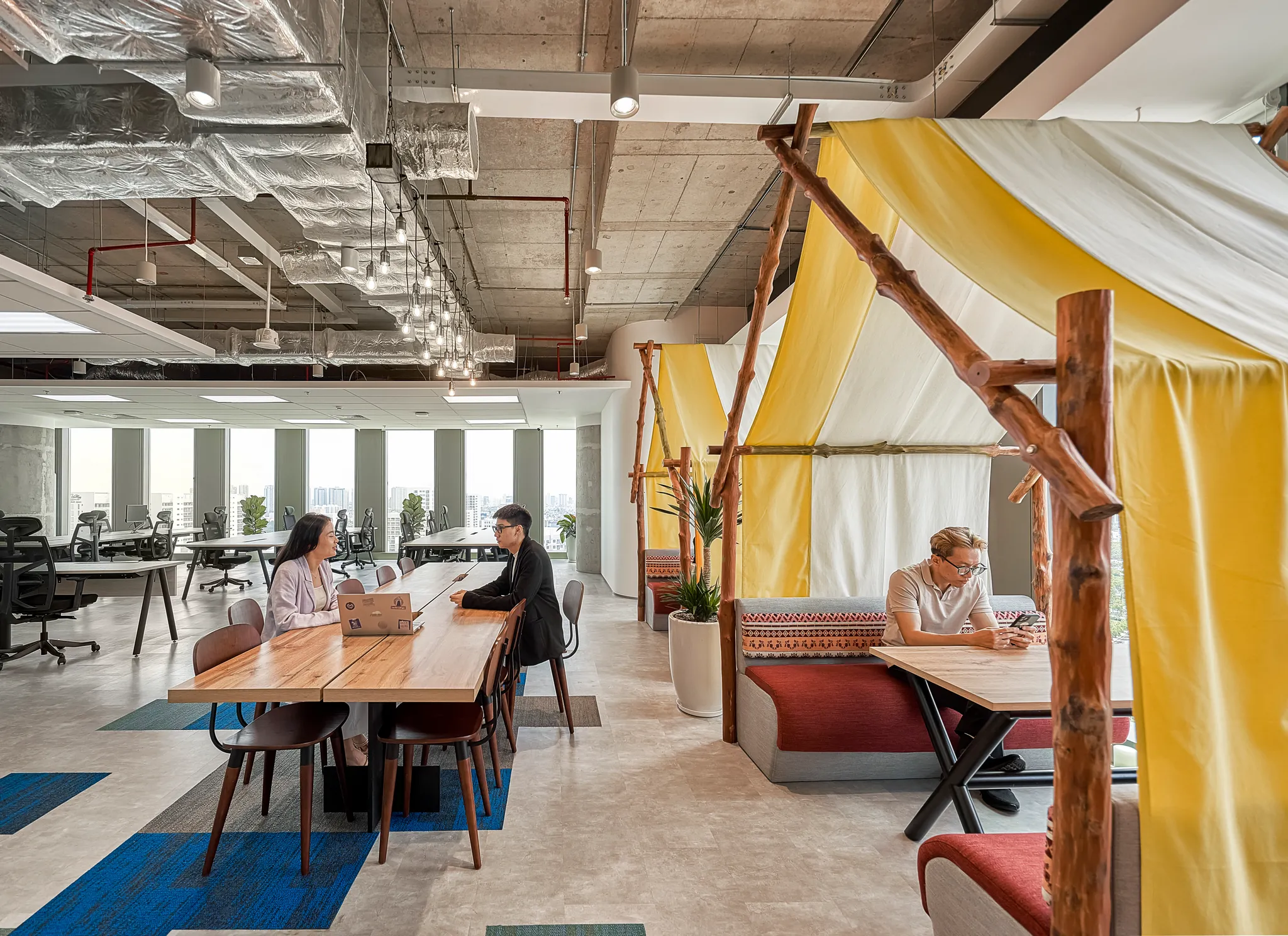 <figcaption>A vibrant color palette in Prudential office to foster the young and dynamic workstyle</figcaption>
